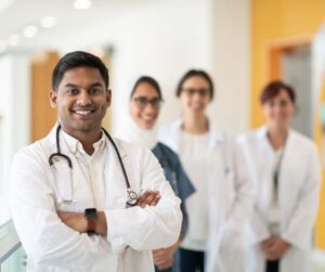 a group of confident young Indian doctors representing how confident students will be after getting a support from Kaplan logiquest to prepare for the USMLE.